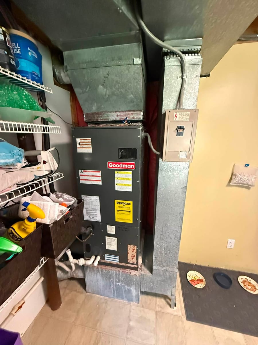 Furnace in a utility room with its control wiring in view